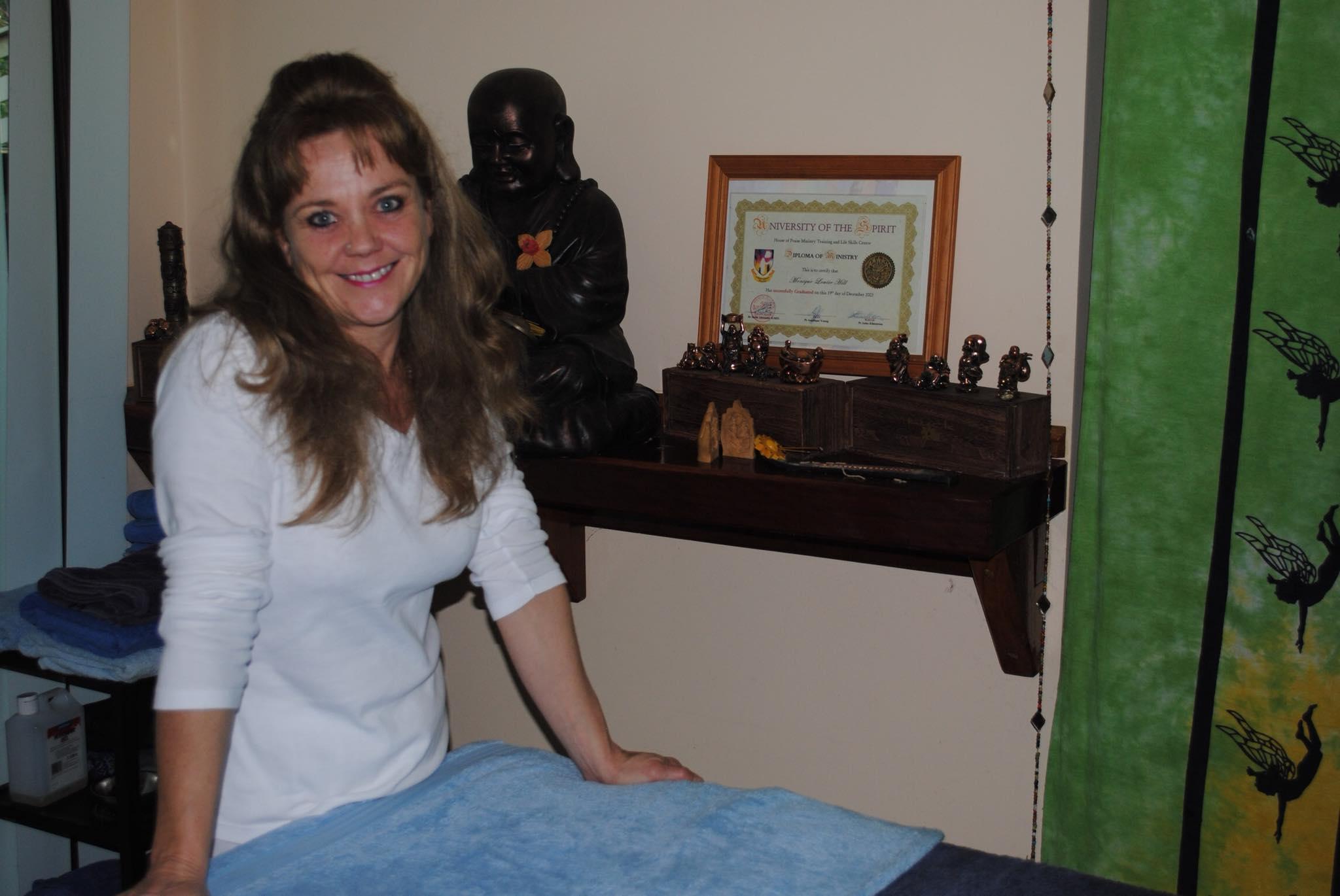 Monique Hill providing massage therapy in her Coffs Harbour studio
